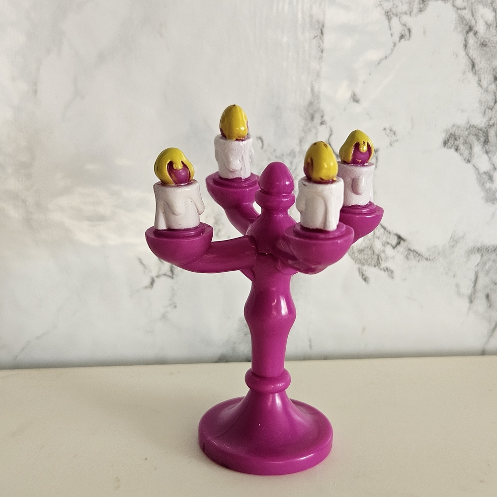 Replacement toy candelabra from the Dora the Explorer playset.